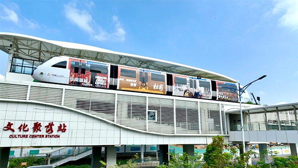 A SkyShuttle train runs past Culture Center Station. File photos A SkyShuttle train runs past Culture Center Station. File photos