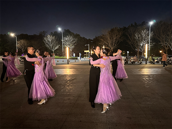 People dance together.